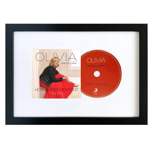 Olivia Newton John Hopelessly Devoted - The Hits CD Framed Album Art SM-19075855512-FD